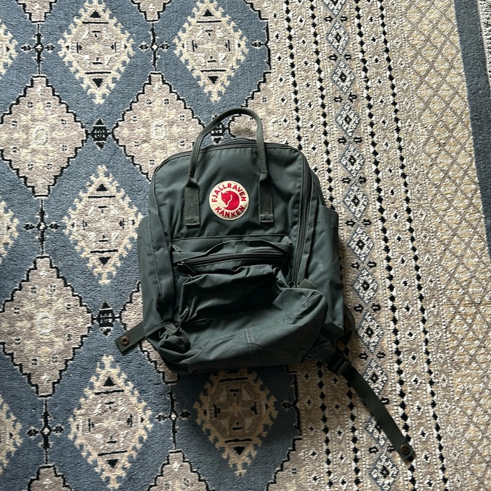 Fjallraven back pack, a little sandy, forest green.